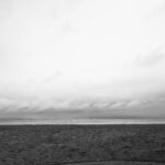 fog bank and beach blended with the ocean, black and white