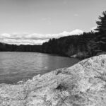 lake and rock in the foreground, black and white